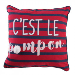 Coussin marin rayé à pompon rouge.